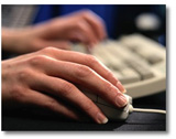 working on computer keyboard